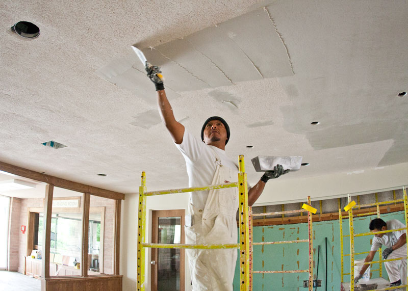 After a week focusing on the building’s internal working—plumbing and electrical systems—crews are re-plastering walls and ceilings.