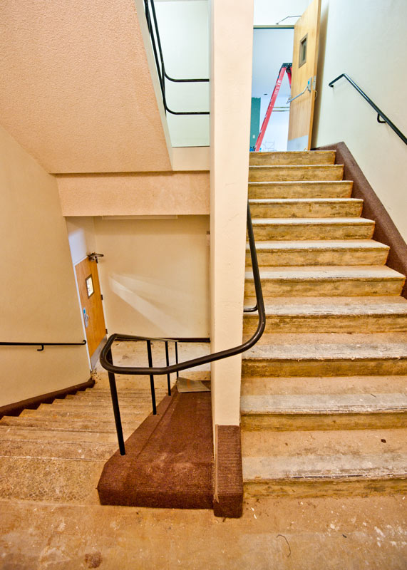 The stairwell stripped and ready for new flooring.