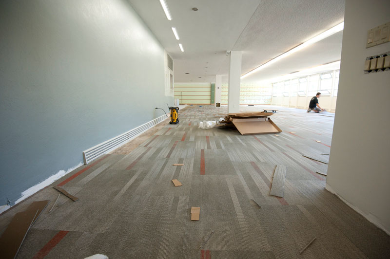 The library is now boasting designer carpet and paint, giving the space a contemporary yet welcoming ambiance.